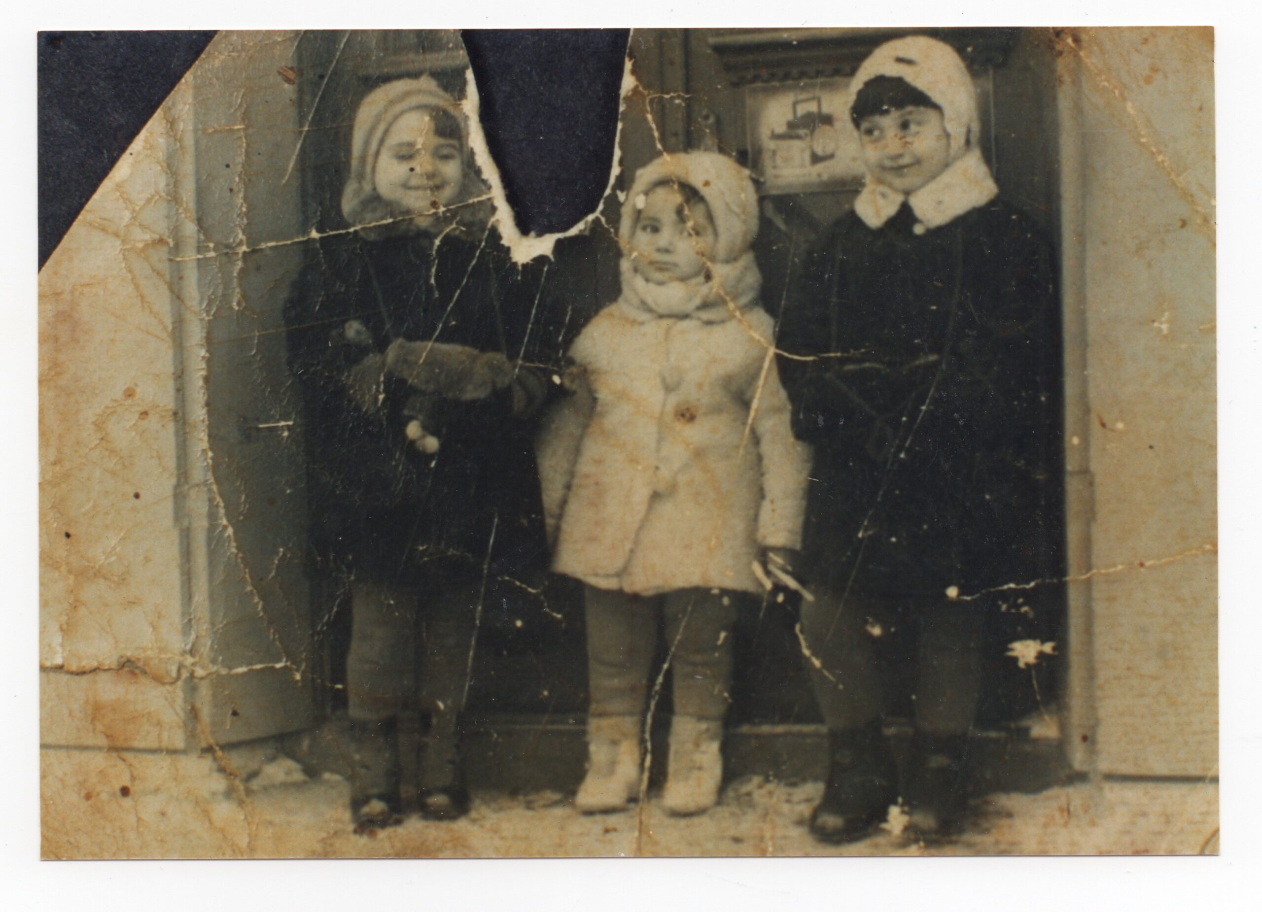 Ruth, Toby, and a friend in front of Miriam drugstore ca. 1939